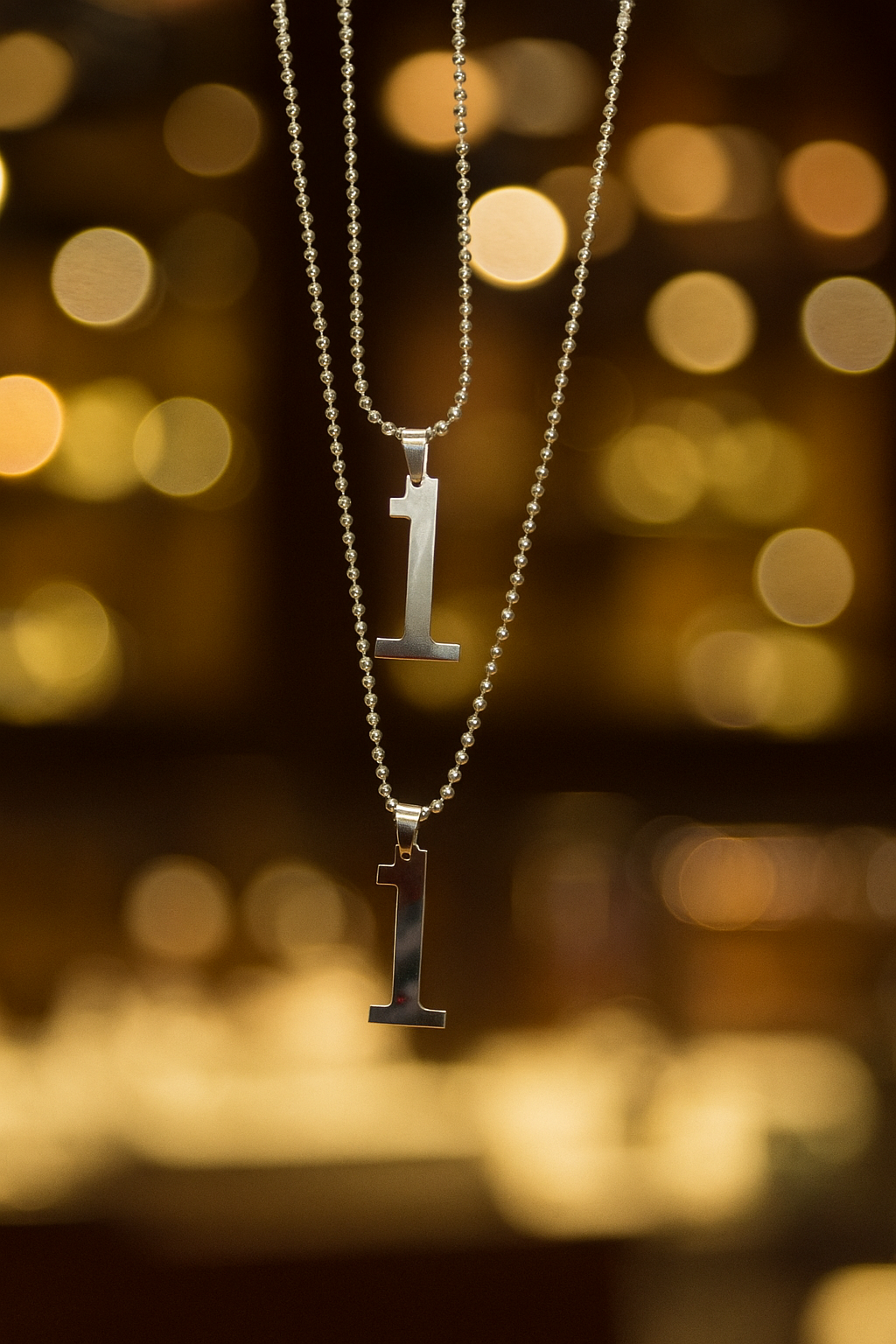 Pair of Shiny Number 1 Necklace H&S Jewelers